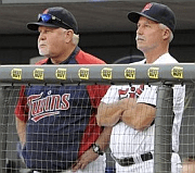Ron Gardenhire and Rick Anderson watching Twins pitching.